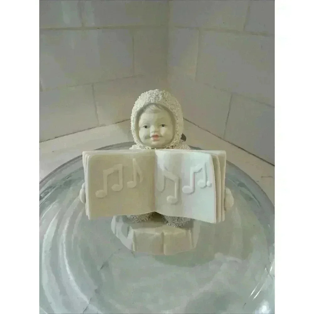 Dept 56 Snowbabies Holding Music book